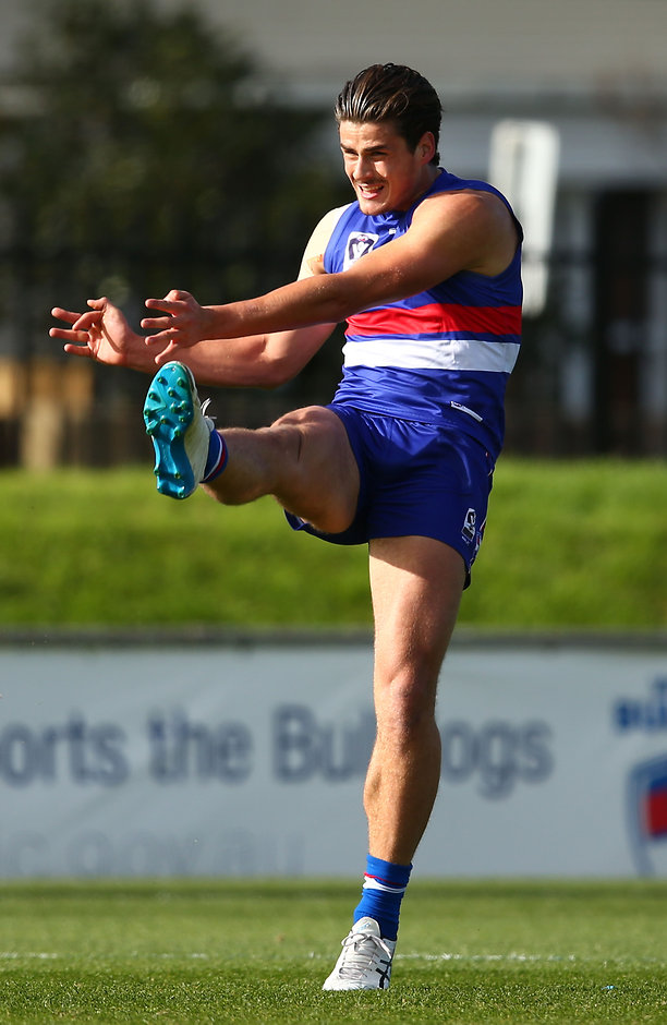 VFL 2016 Rd 10 - Footscray v Geelong MELBOURNE, AUSTRALIA - JUNE 11: Tom Boyd of the Footscray Bulldogs kicks the ball during the round ten VFL match between the Footscray Bulldogs and Geelong at Whitten Oval on June 11, 2016 in Melbourne, Australia. (Photo by Scott Barbour/AFL Media)
